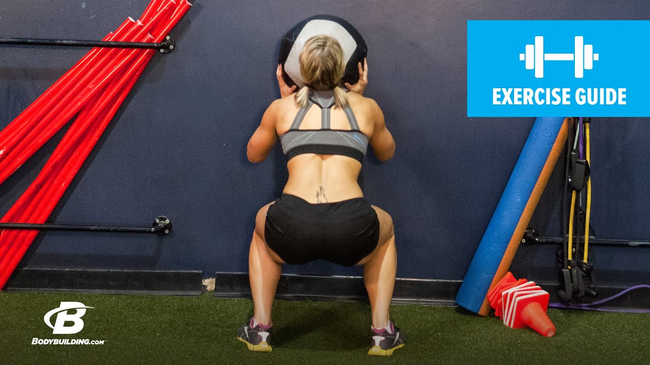 Wall Ball Squats | Exercise Guide